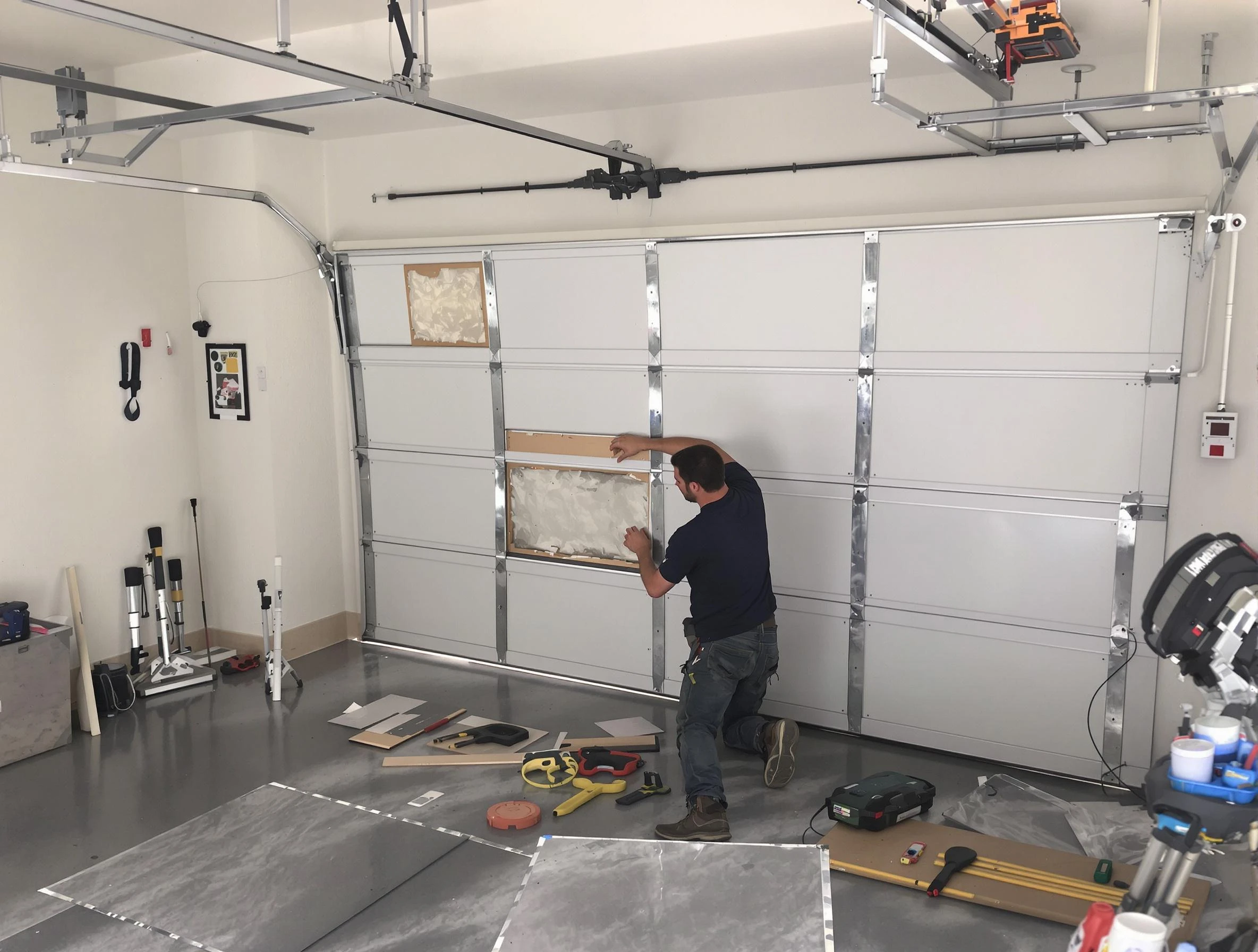 Garage Door Panel Repair in Peters